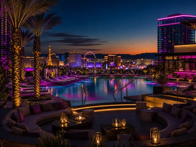Las Vegas hotel pool deck with neon twilight glow
