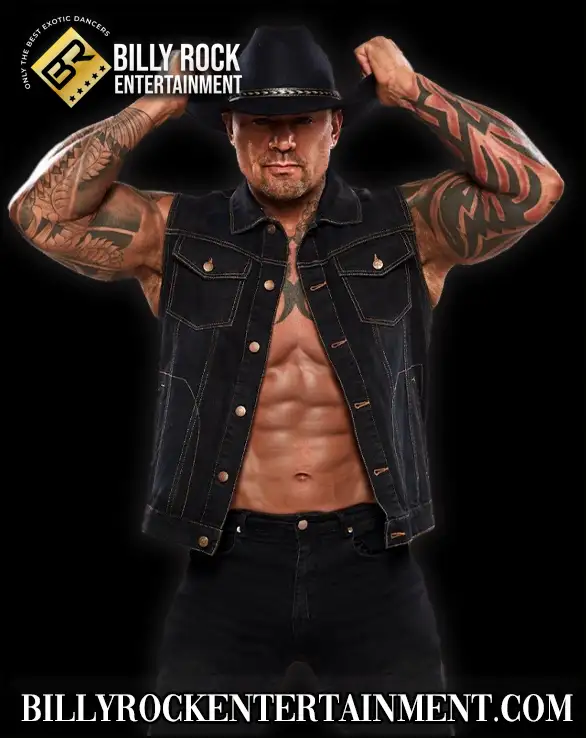AJ STEELE cowboy male stripper in black hat and open denim vest flexing in a studio photo