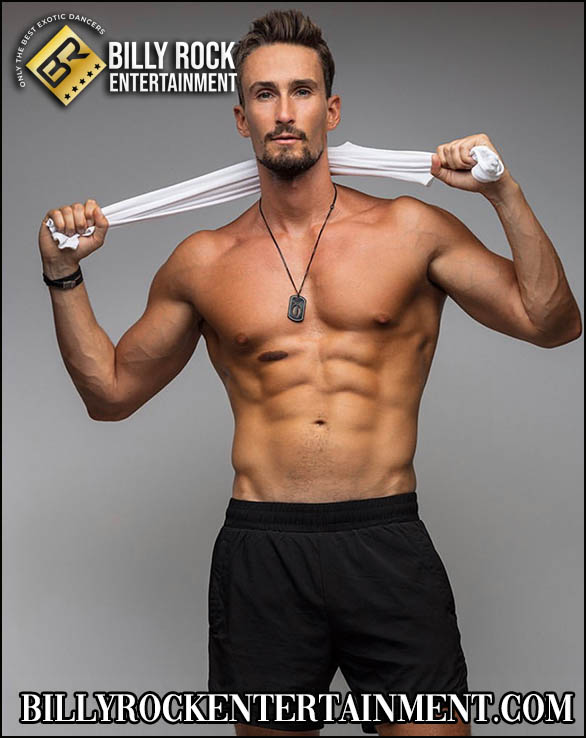 Ripped male stripper with white shirt behind head, displaying his abs