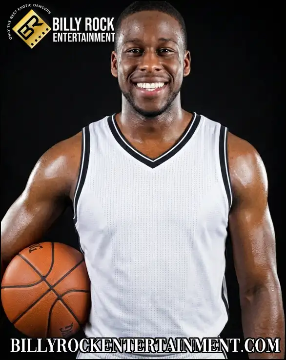 Athletic male stripper holding a basketball for bachelorette party and birthday party bookings