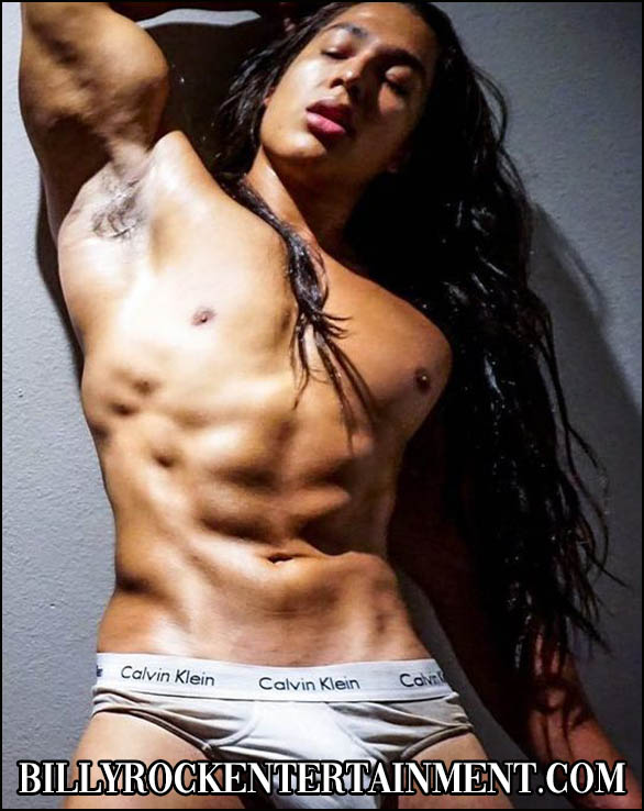 Fabio, a fit male stripper posing shirtless with a lean, athletic build