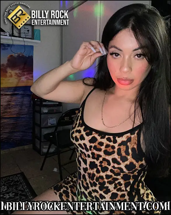 Female stripper with leopard print clothing and long black hair