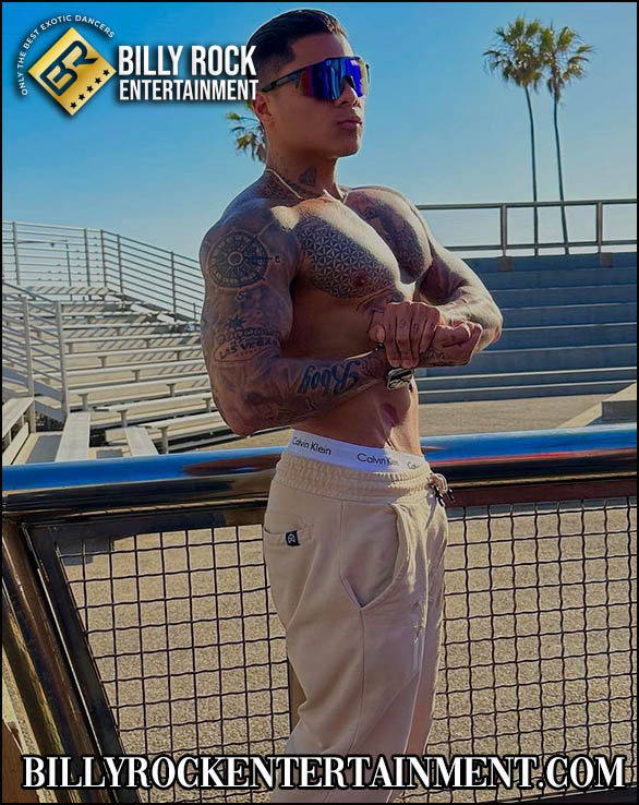 Joe: Confident outdoors, tattoos, sunglasses, light pants, bleachers, palm trees.