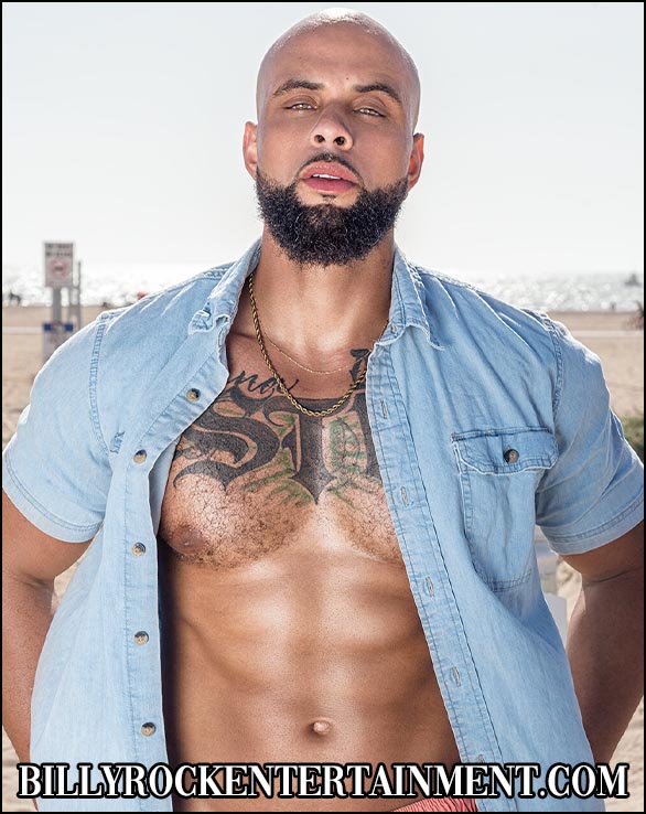 Blackwood, a muscular male exotic dancer, posing confidently with an athletic build
