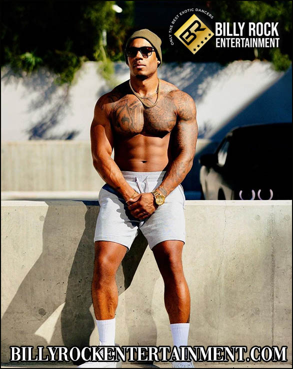 Show Time: Muscular male dancer, beanie, sunglasses, boxer shorts, outdoor setting.