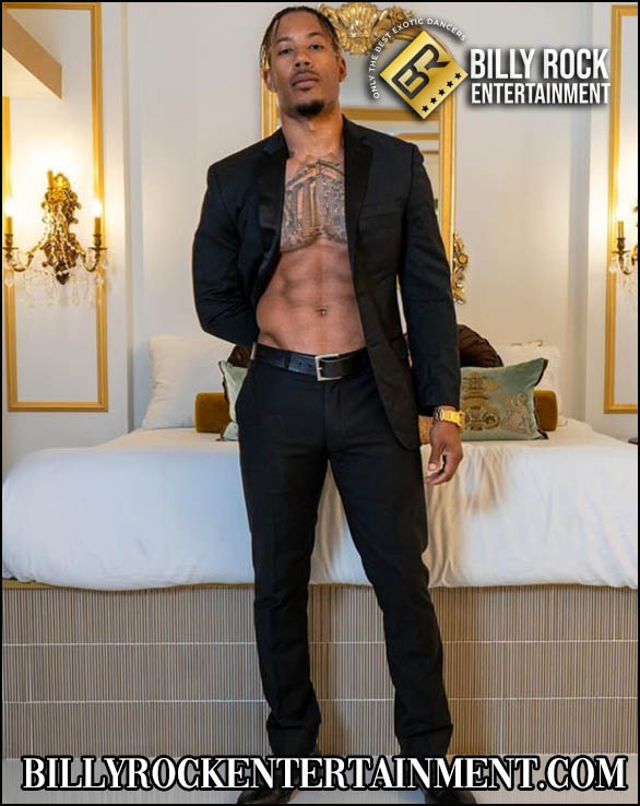 Show Time: Black pants, open blazer, toned torso, luxurious room.